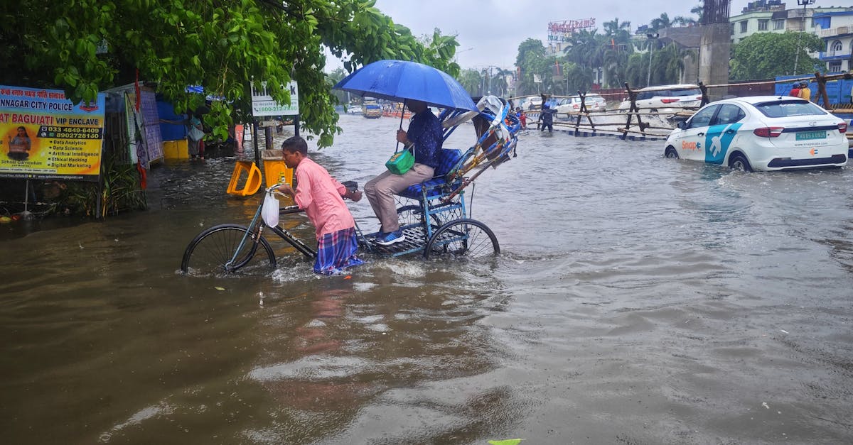 A busy street in Kolkata waterlogged due to heavy monsoon rains.