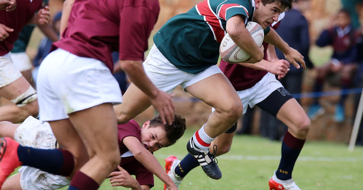Intense rugby match with players in action, showcasing strength and teamwork.